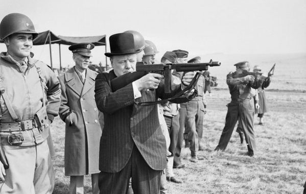 Winston_Churchill_fires_a_Thompson_submachine_gun_alongside_the_Allied_Supreme_Commander,_General_Dwight_D_Eisenhower,_during_an_inspection_of_US_invasion_forces,_March_1944._H36960