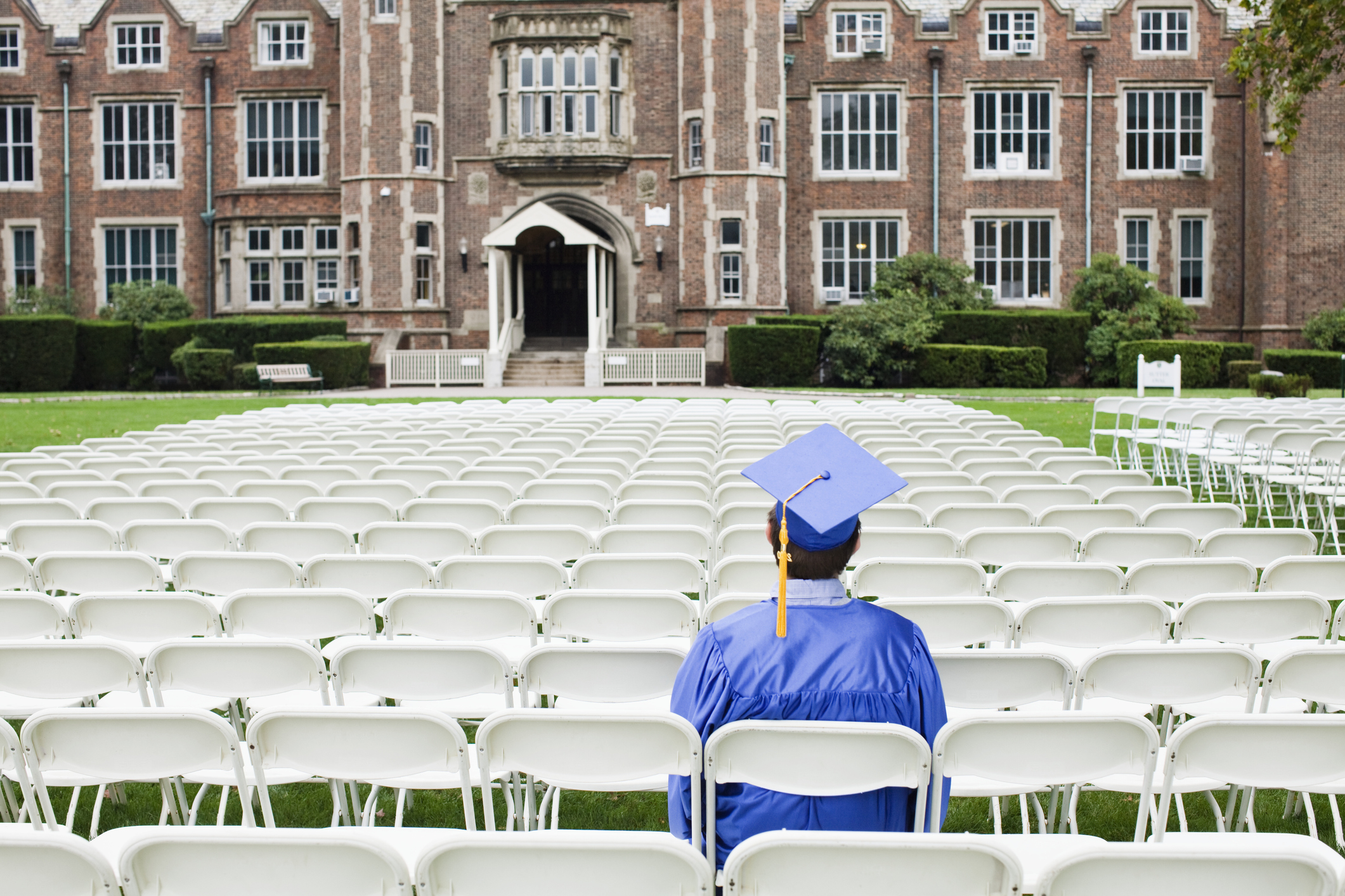 Graduate sitting alone