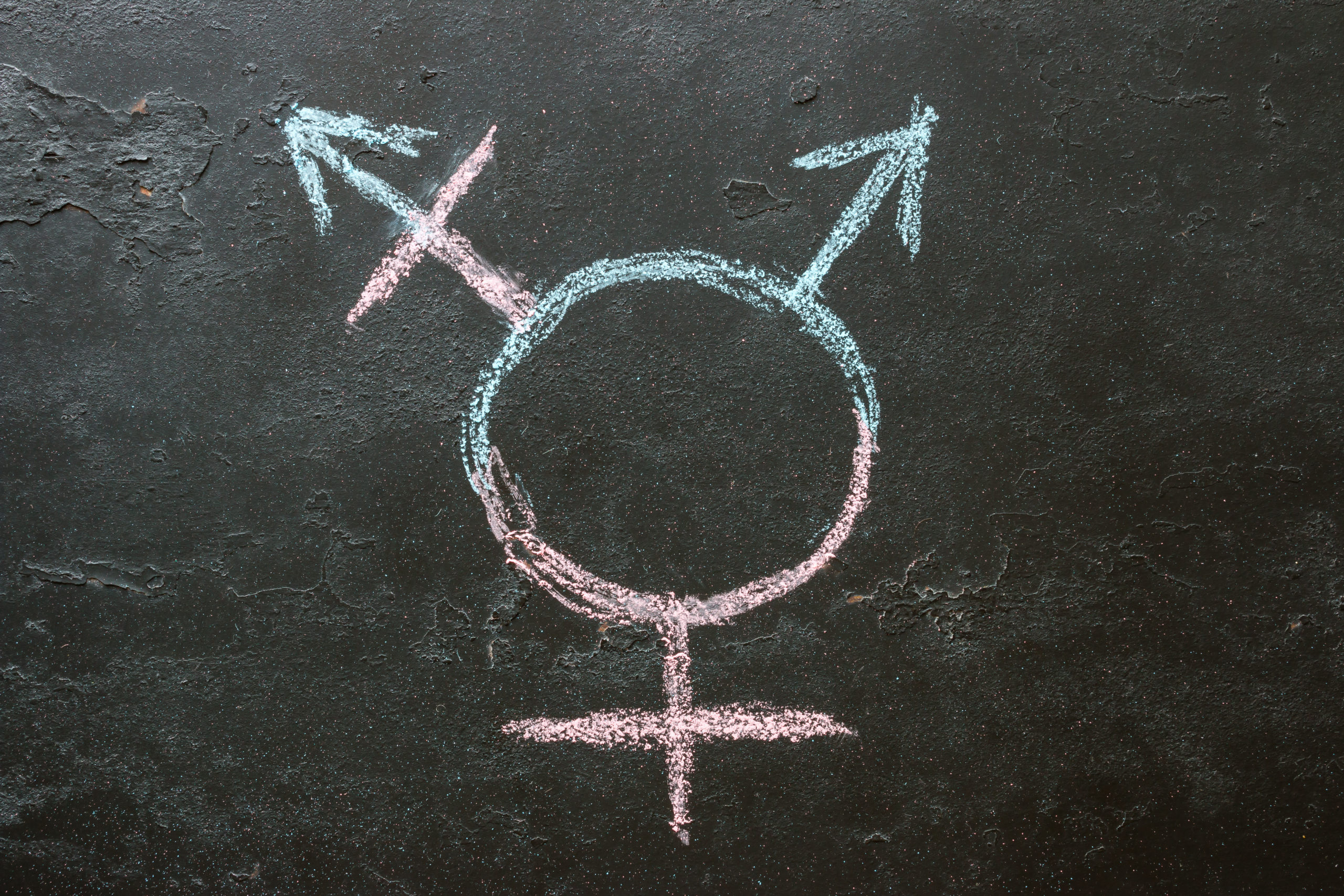 Transgender symbol on a black background close-up