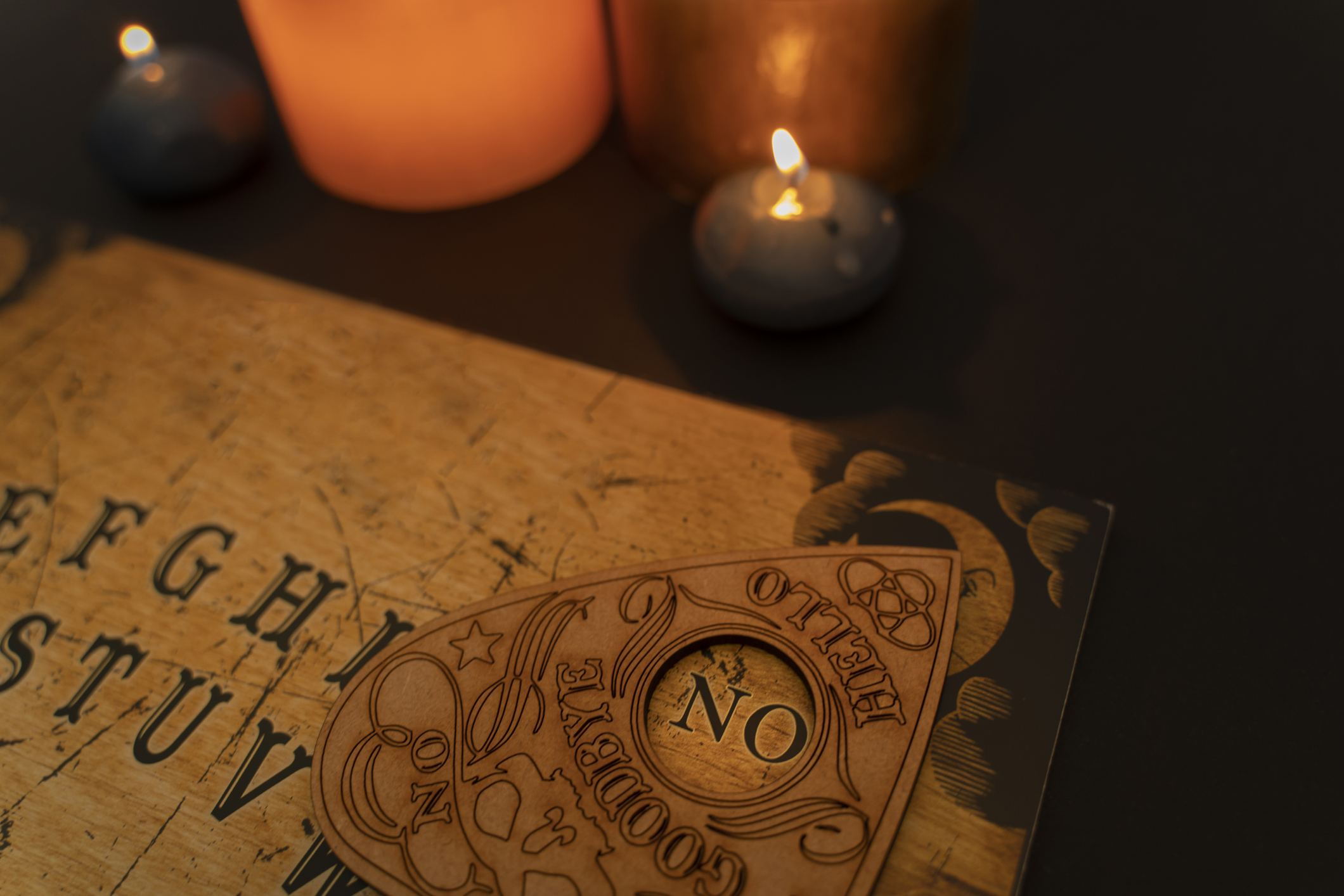 Ouija Board On Dark Background