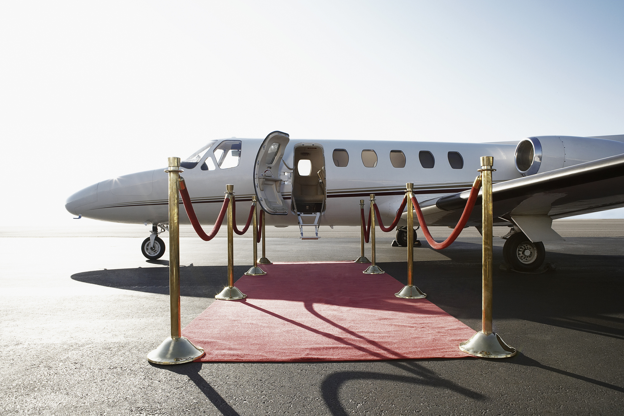 Private airplane with red carpet