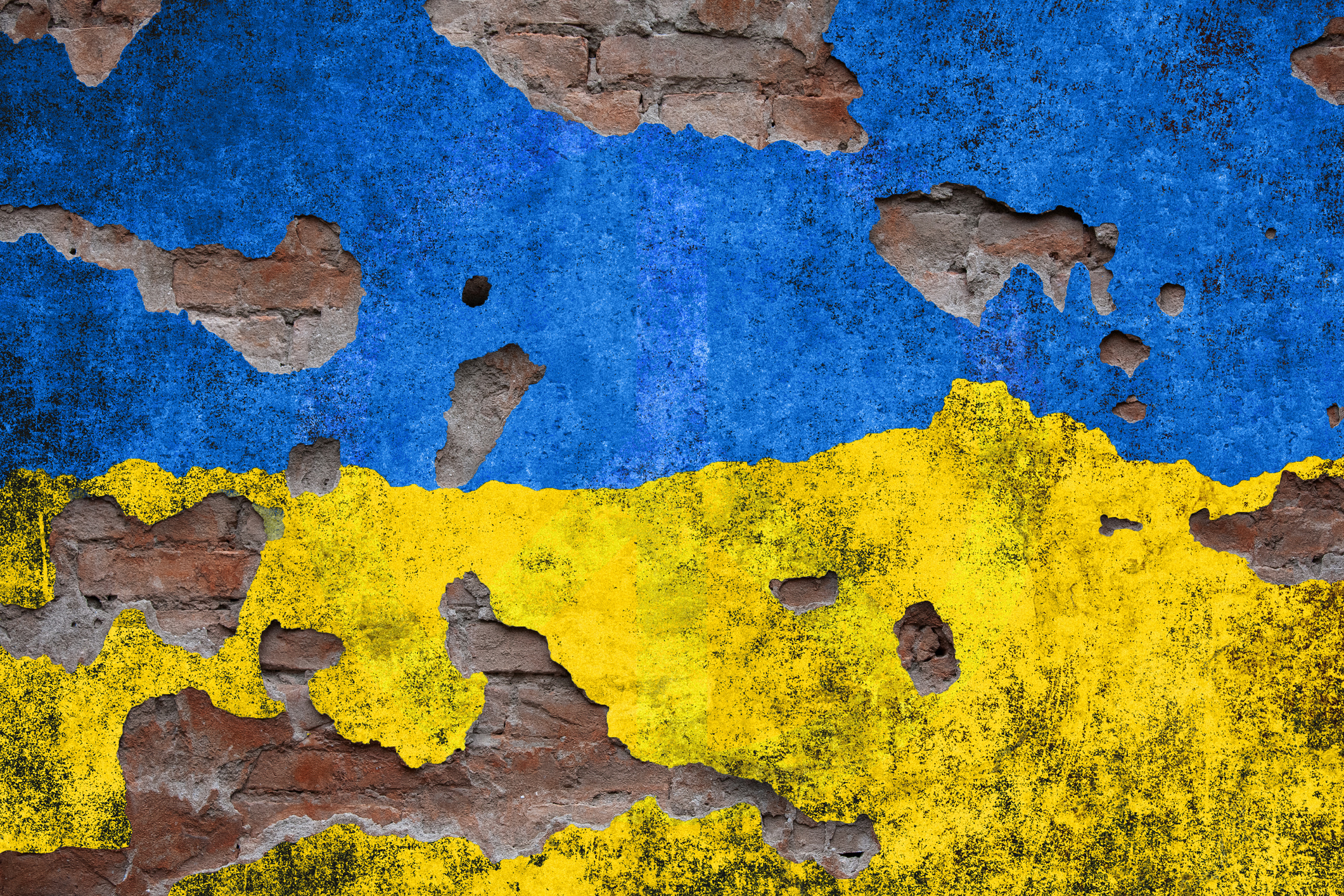 Ukraine colors on damaged wall