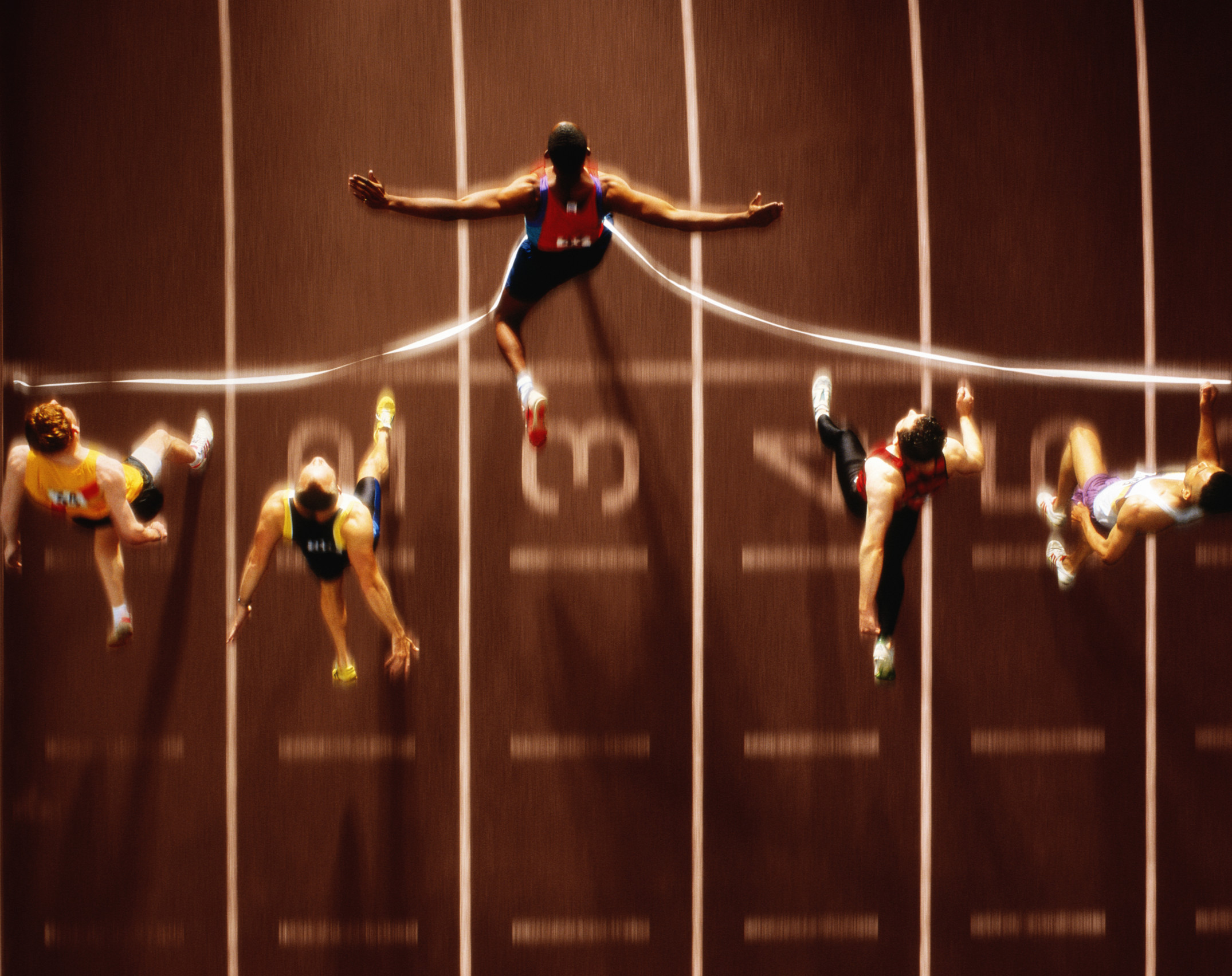 Athletics, runners at finish line, overhead view (Digital Composite)