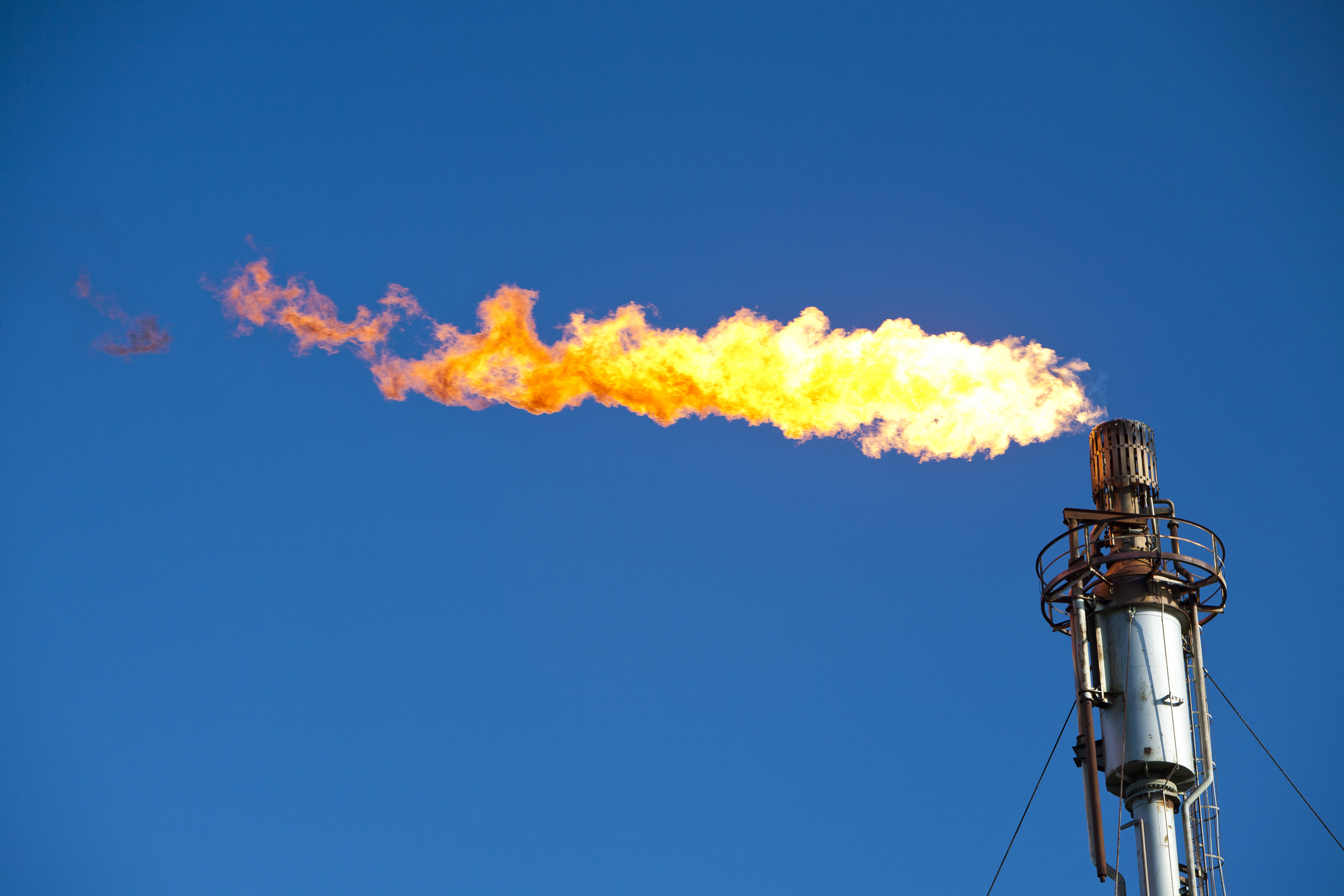 Flaring off gas at the Flotta oil terminal on the Island of Flotta in the Orkney’s Scotland, UK.