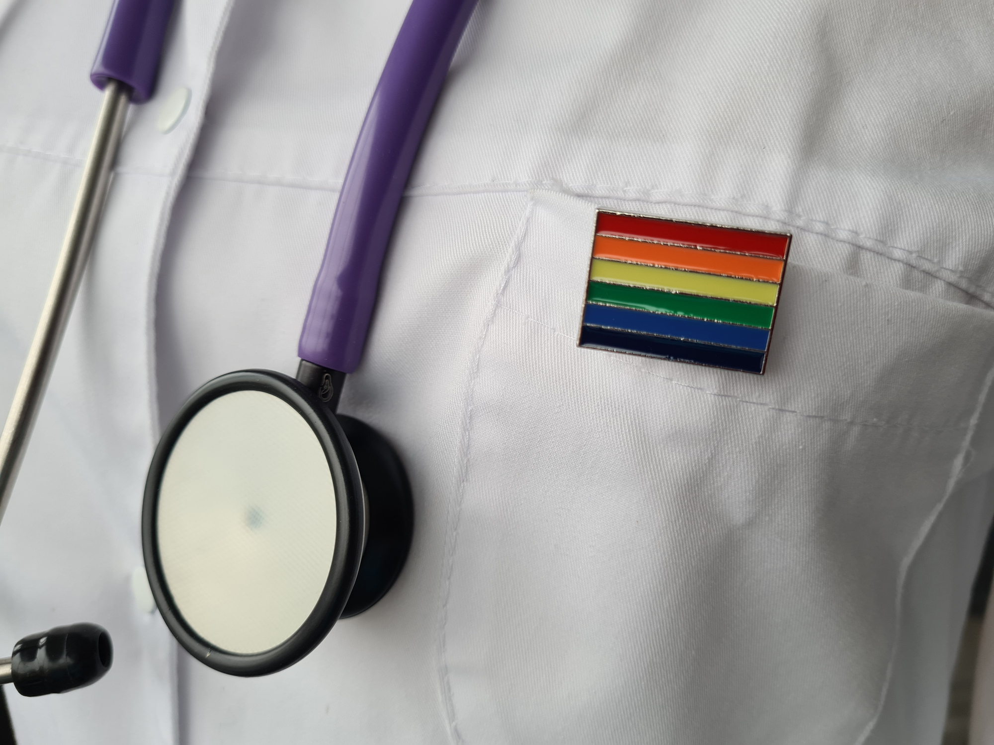 Doctor stethoscope and rainbow flag icon symbol of LGBT pride