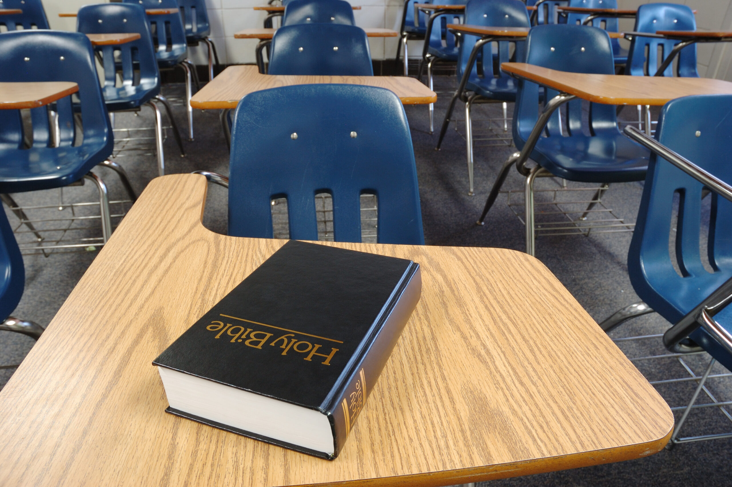 Holy Bible Lying on a Parochial School Desk