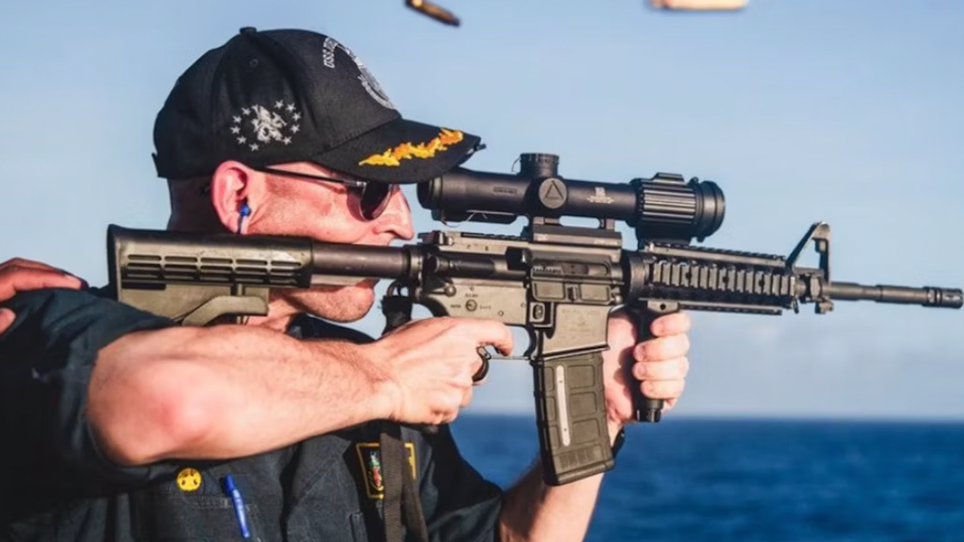 Navy skipper roasted for posing with rifle with scope on backward CREDIT US NAVY