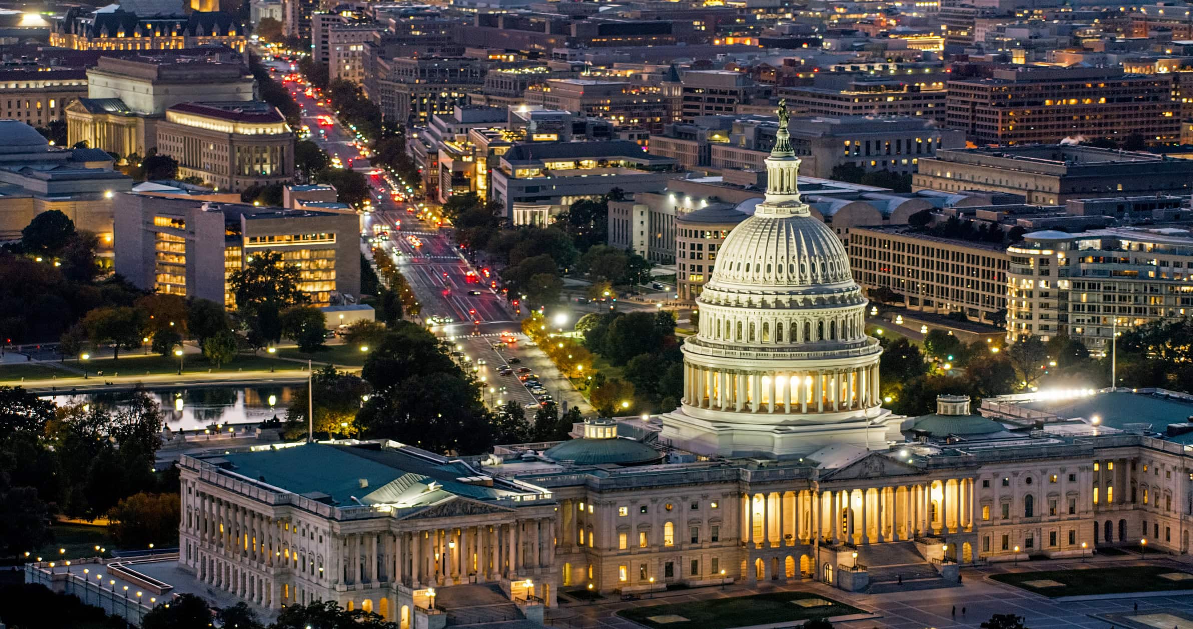 High Angle Aerial Shot of US Capitol Building and Pennsylvania Avenue at Twilight