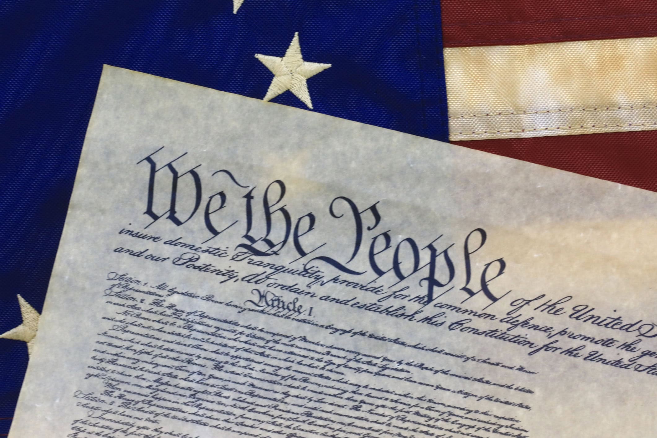 United States Constitution document and flag