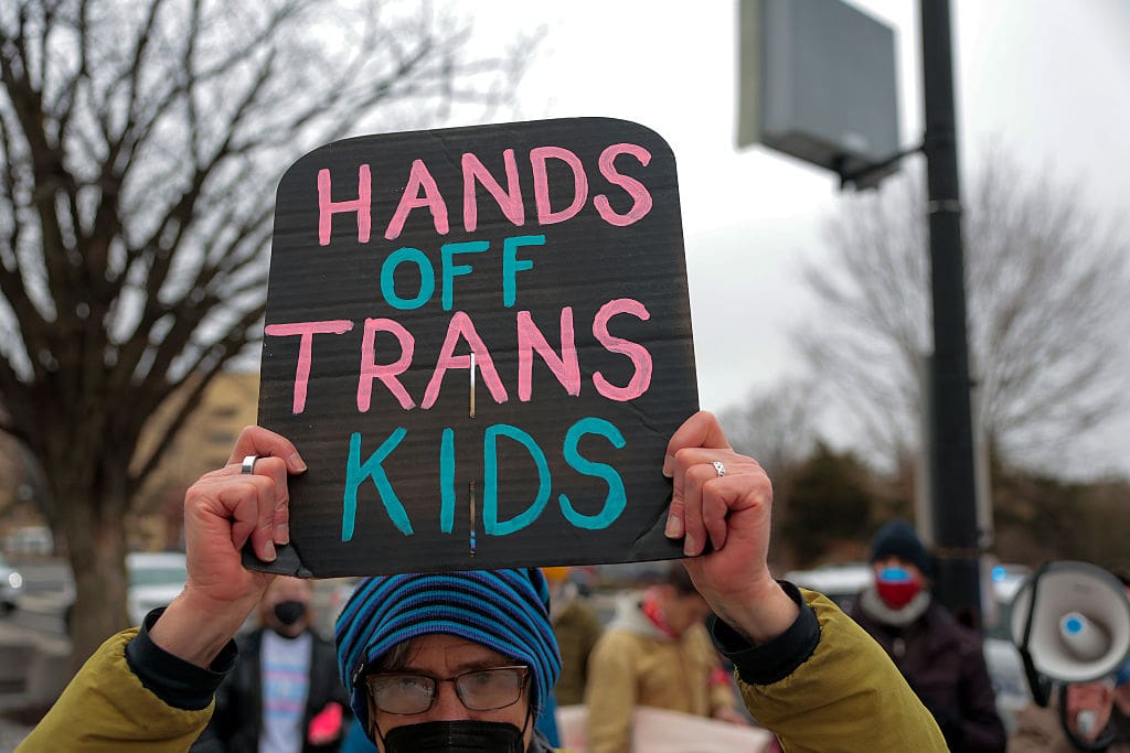 Transgender Rights Supporters Protest Outside HHS Headquarters In Washington DC