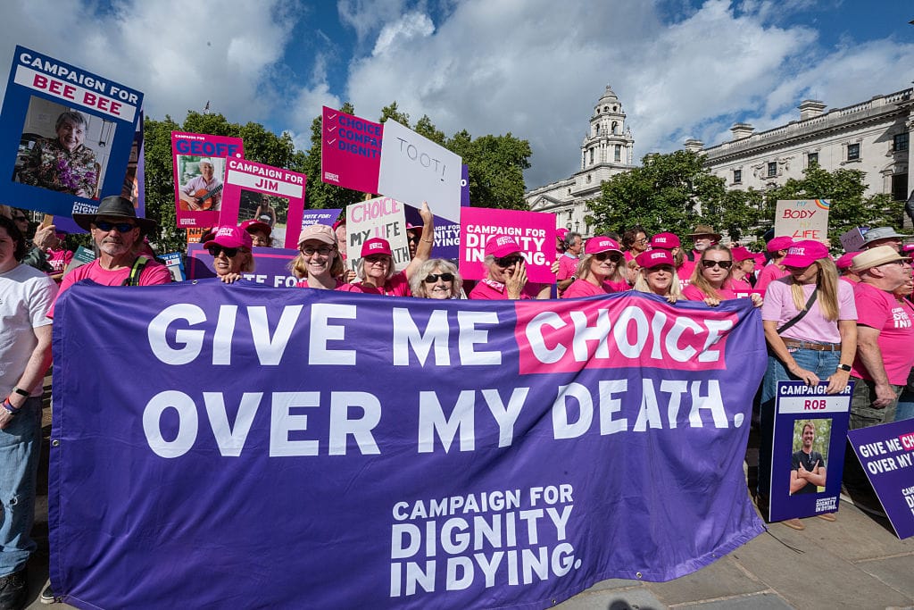 Campaigners For And Against Assisted Dying Bill Demonstrate In Westminster