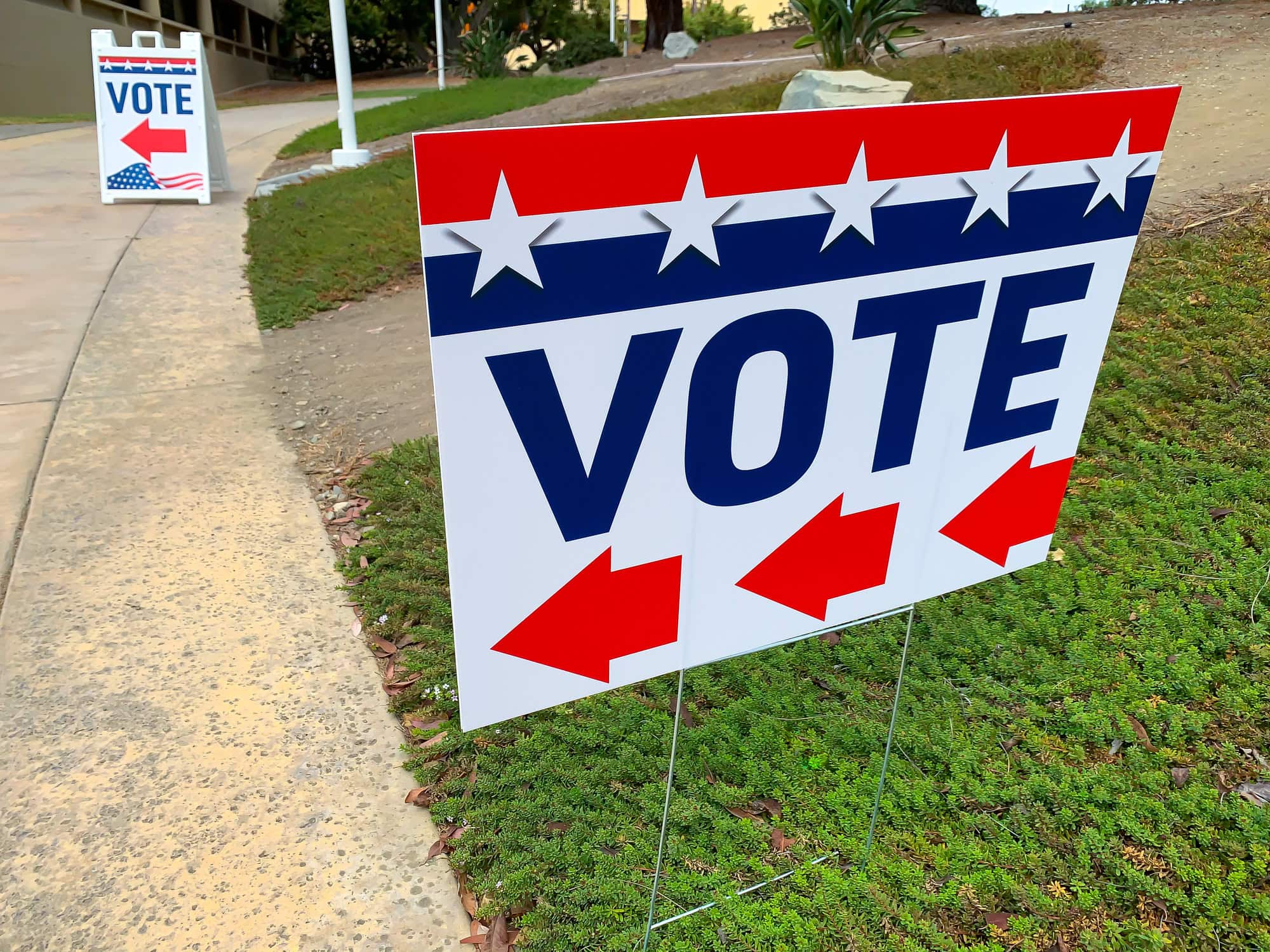 “Vote” directional sign